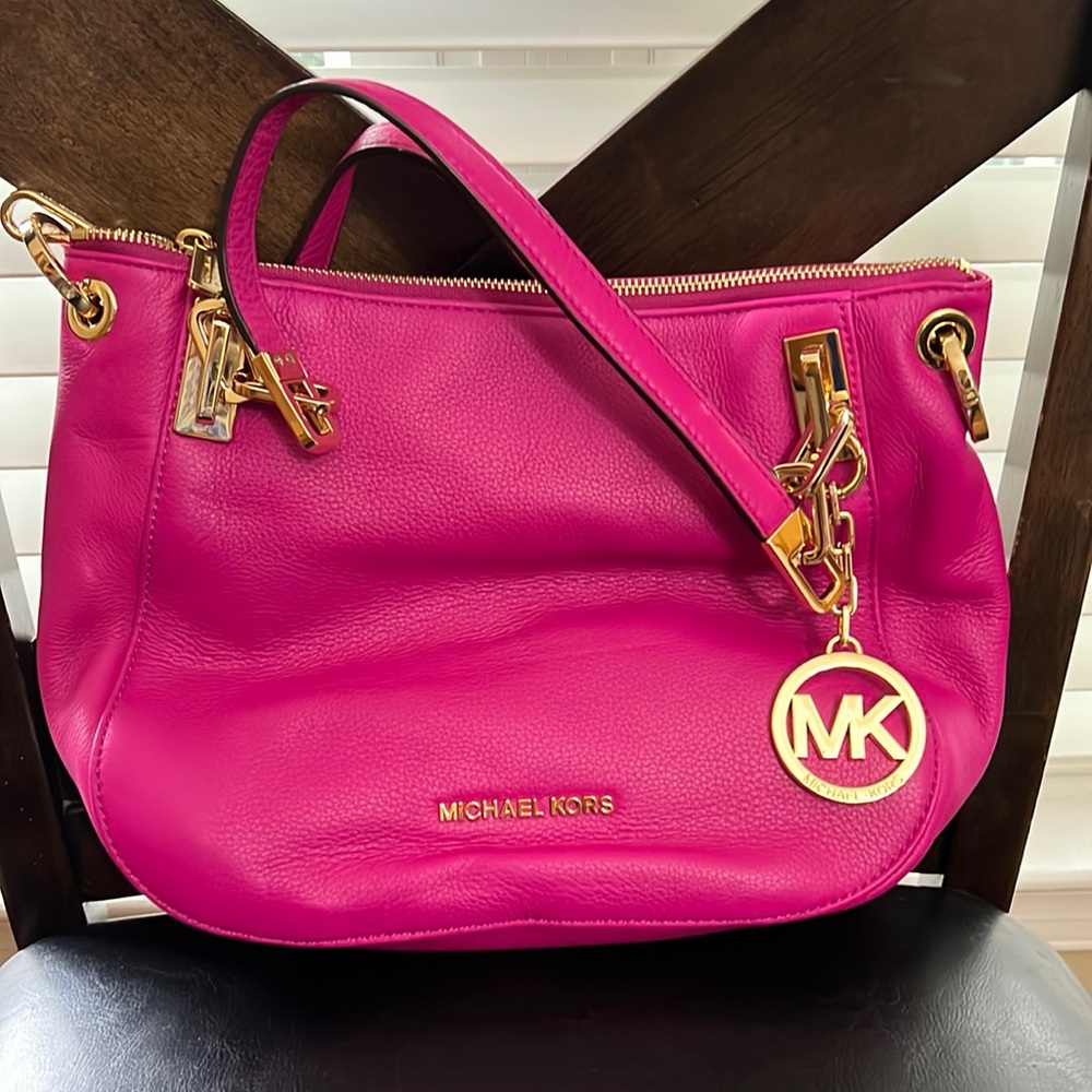 Michael Kors, Bright Pink medium purse with Gold detail.